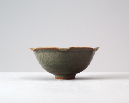 Greenware bowl with lotus leaves and a tortoisefront