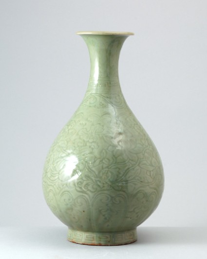 Greenware vase with floral decorationfront