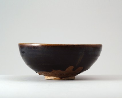 Black ware bowl with stripesfront
