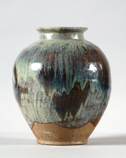 Black ware jar with blue splashesfront