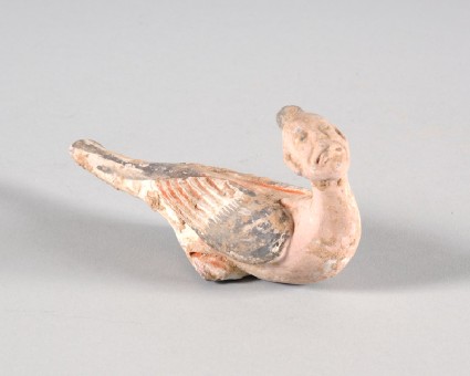 Figure of a bird with a human headfront