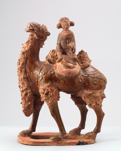 Figure of a camel carrying a young girlfront