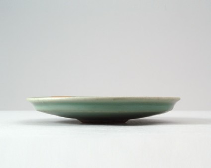 Greenware dish with dragonsfront