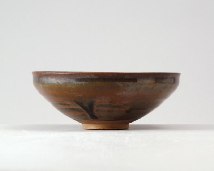 Black ware bowl with russet iron splashesfront