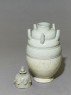 Greenware burial vase with lid in the form of a lotus (oblique, open)