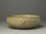 Greenware bowl with animal masks (oblique)