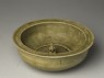 Greenware basin with small kneeling figure (oblique)