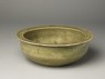 Greenware basin with small kneeling figure (oblique)