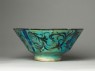 Bowl with animals against a foliate background (side)