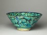 Bowl with animals against a foliate background (oblique)