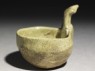 Greenware ladle with handle in the form of a bird-head (oblique)