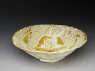 Bowl with seated figure (oblique)