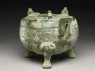Ritual food vessel, or ding, with hunting scenes (oblique)
