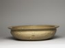 Greenware basin with fish, phoenix, and riding figures (oblique)