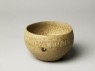 Greenware bowl with ribbed decoration (oblique)