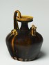 Black ware ewer with chicken head spout (oblique)