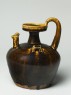 Black ware ewer with chicken head spout (oblique)