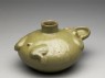 Greenware water pot in the form of a frog (oblique)