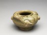 Greenware water pot in the form of a frog (oblique)