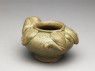Greenware water pot in the form of a frog (oblique)
