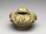 Greenware water pot in the form of a frog (oblique)