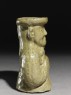 Greenware burial vessel section in the form of man holding a goat (oblique)