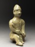 Greenware burial figure of man holding a staff (side)