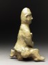 Greenware burial figure of man holding a staff (side)