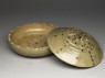 Greenware bowl and lid surmounted by an animal (oblique, open)