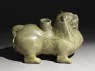 Greenware vessel in the form of a lion (oblique)