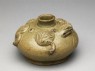 Greenware water pot in the form of a frog (oblique)