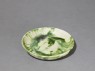 Saucer with splashed decoration in green (oblique)