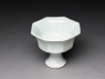 Octagonal stem cup with flower (oblique)
