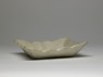 White ware dish with lotus flowers (side)