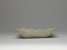 White ware dish with lotus flowers (side)