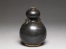 Black ware vase in double-gourd form (oblique)