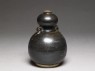 Black ware vase in double-gourd form (oblique)