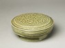 Greenware circular box and lid with floral design (oblique)