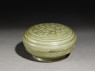 Greenware circular box and lid with floral decoration (oblique)