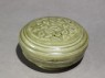 Greenware circular box and lid with floral decoration (oblique)