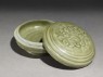 Greenware circular box and lid with floral decoration (oblique, open)