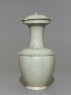Greenware vase with flower-shaped lid (side)