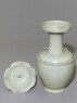 Greenware vase with flower-shaped lid (oblique, open)