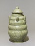 Greenware burial vase with spouts (side)