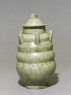 Greenware burial vase with spouts (side)