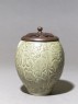 Greenware jar with floral decoration and modern lid (side)