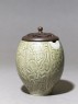 Greenware jar with floral decoration and modern lid (side)