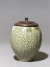 Greenware jar with floral decoration and modern lid (side)