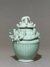 Greenware funerary jar with dragon (side)