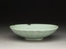 Greenware dish with fluting, and lotus petals on the outside (oblique)